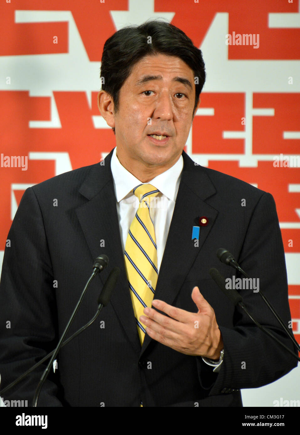 September 26, 2012, Tokyo, Japan - Japan's former Prime Minister Shinzo Abe speaks during an inaugural news conference at the Liberal Democratic Party headquarters in Tokyo following his reelection as the LDP president on Wednesday, September 26, 2012. Abe has become the first LDP chief to make a comeback to the top post since the party was founded in 1955. Abe could also become Japan's prime minister for the second time , should the LDP oust the Democratic Party of Japan from power in the next general election to be held within a year. Abe became prime minister in September 2006 but quit the  Stock Photo