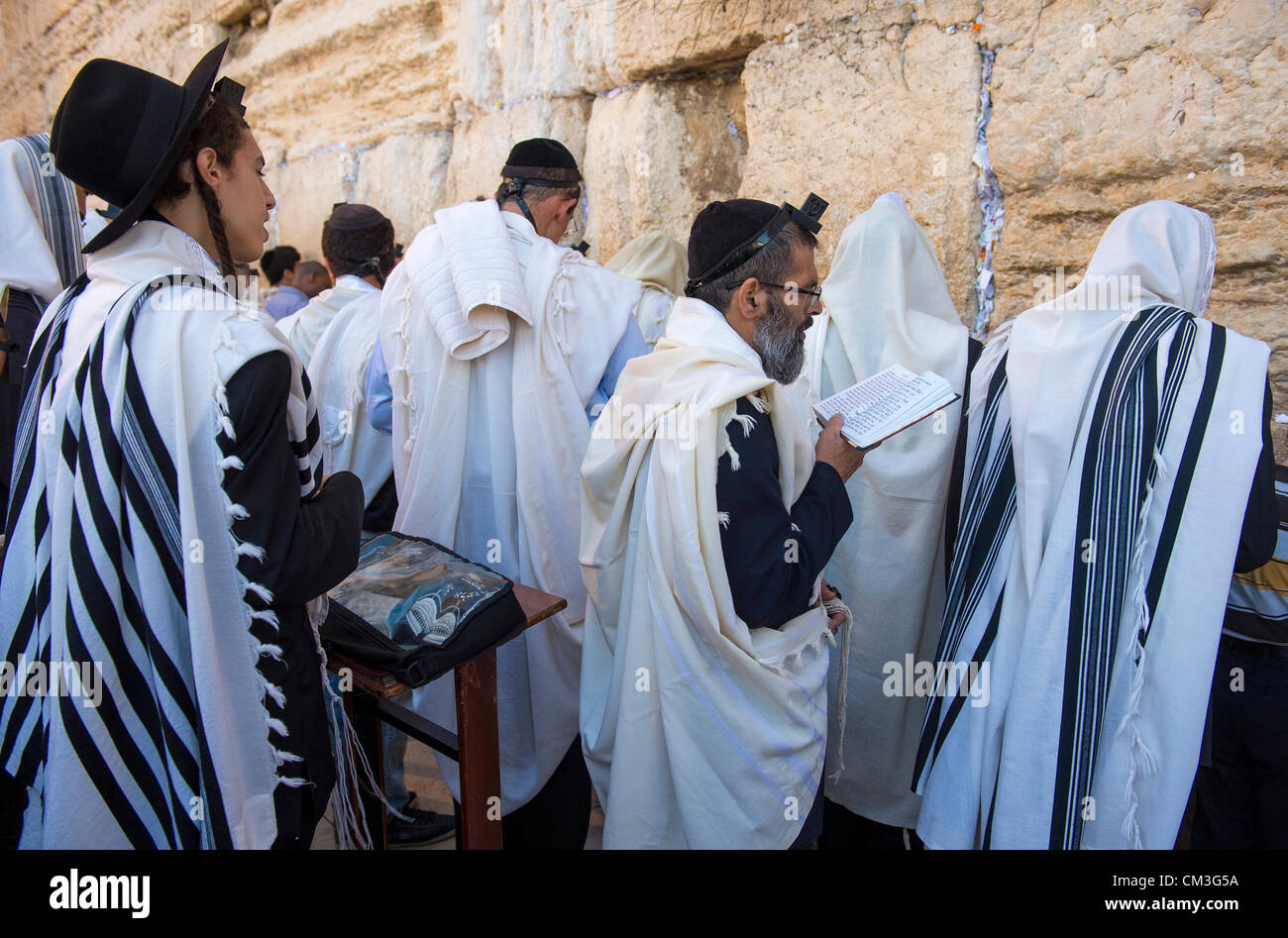 Jewish men prays during the penitential prayers the Selichot , held on the Wailing wall in Jerusalem Israel Stock Photo