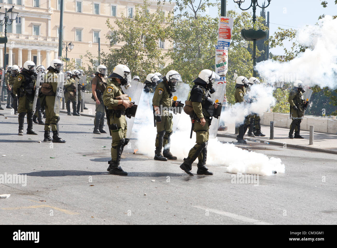 26/09/2012 Athens Greece. Riot police react amidst firebombs thrown ...