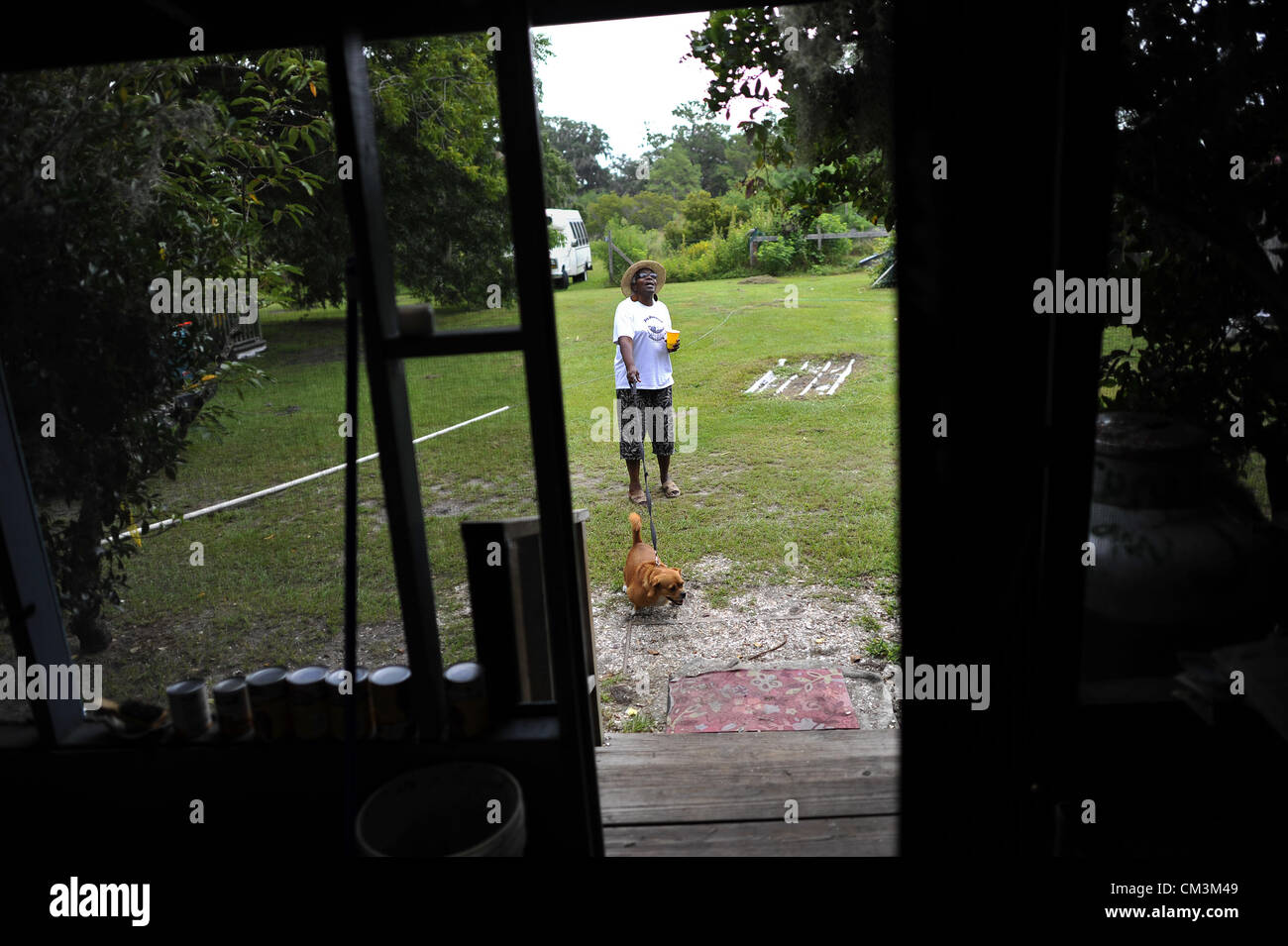 Aug. 23, 2012 Sapelo Island, Ga, USA Cornelia Bailey walks her dog