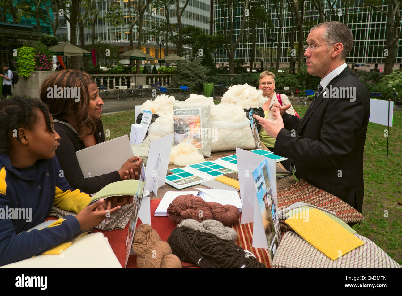 USA. September 27, 2012, New York, NY.  Tim Booth, product development manager, British Wool Marketing Board, makes the pitch for wool in New York's Bryant Park as part of the Campaign for Wool's new US marketing effort.  Britain's Prince Charles is a sponsor of the Campaign for Wool. Stock Photo
