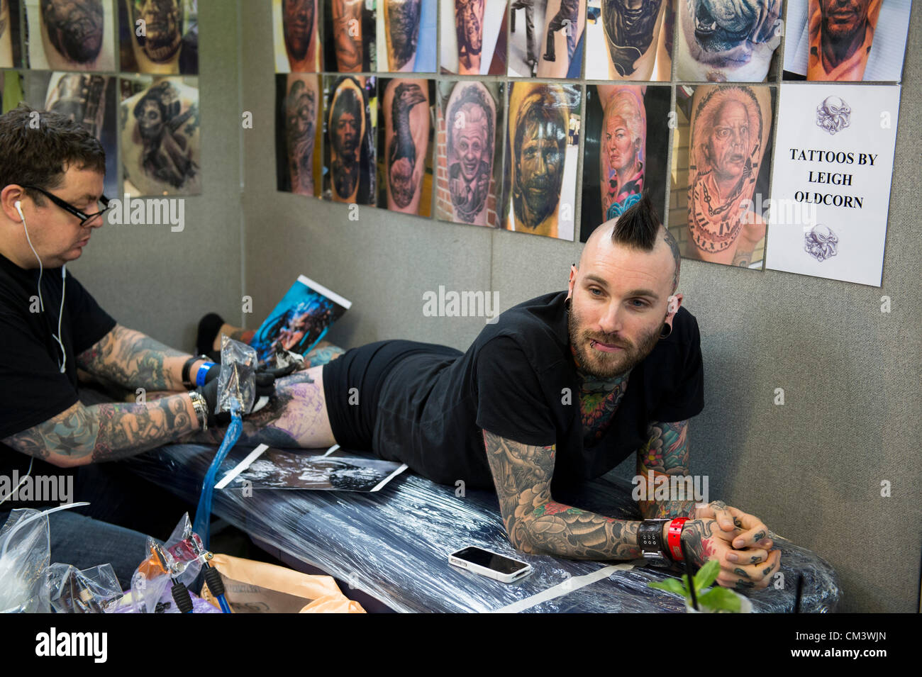 28th September 2012, London, UK. The 8th London Tattoo Convention begins today at Tobacco Dock in the East End of London. Tattooists and tattoo fans from around the world flock to the venue. Stock Photo