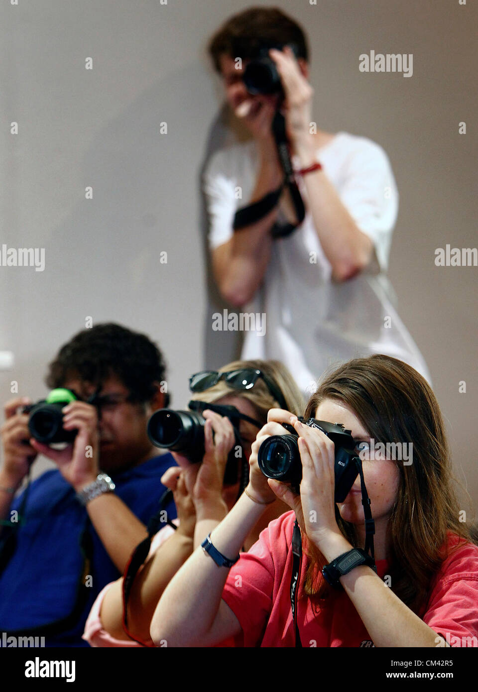 Sept. 26, 2012 - Oxford, Ms, U.S. - Septmeber 26, 2012 - University of Mississippis students take pictures of during a panel discussion for the 50th anniversary of James Meredith's enrollment as the first black student at Ole Miss in 1962. (Credit Image: © Mark Weber/The Commercial Appeal/ZUMAPRESS.com) Stock Photo