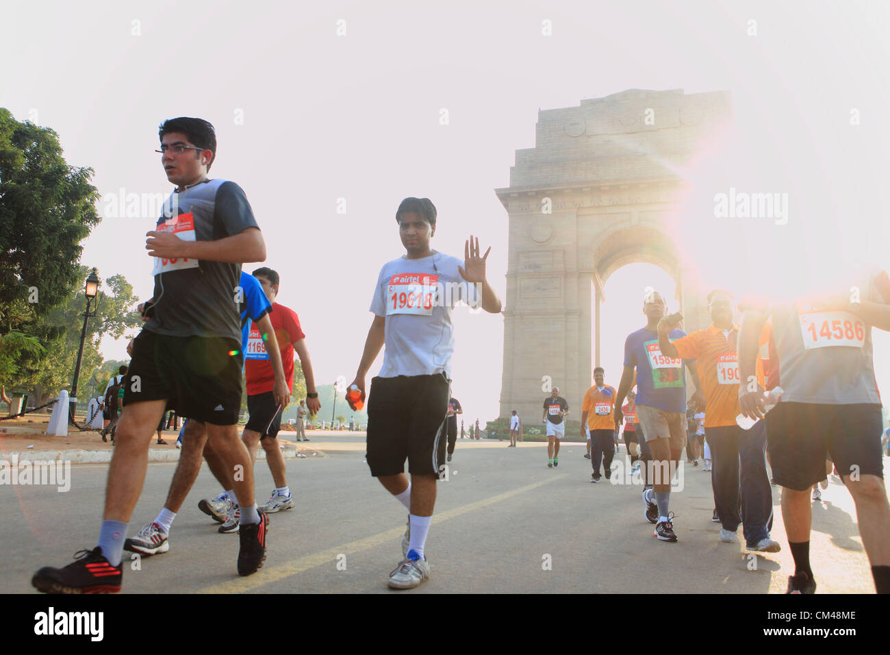 Sep. 30, 2012 - New Delhi, India - Delhi residents participate in the New Delhi Half Marathon as they run by the famous New Delhi landmark, the India Gate. (Credit Image: © Subhash Sharma/ZUMAPRESS.com) Stock Photo