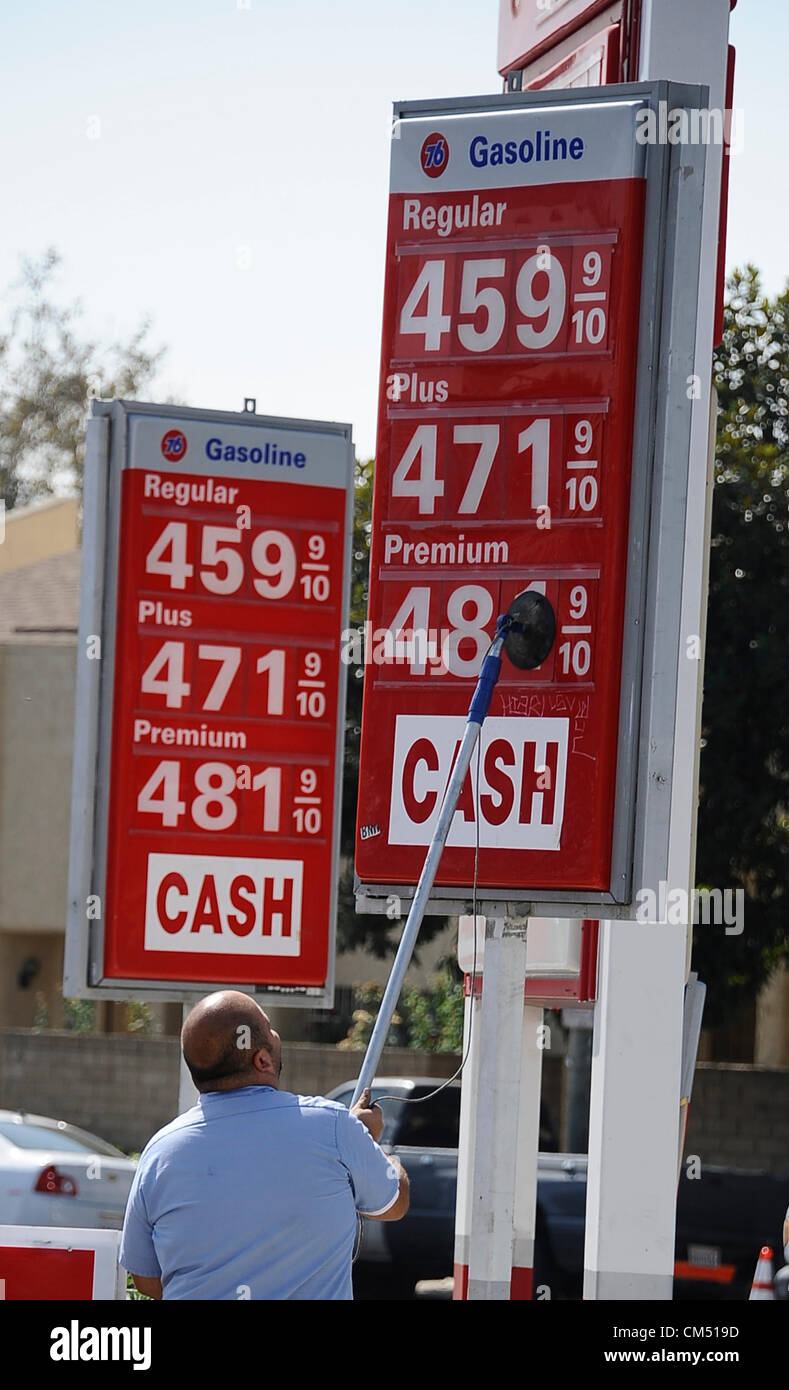 Oct. 5, 2012 - Los Angeles, California, U.S. - An attendant raises prices at a 76 gas station in Van Nuys. Californians woke up to a shock Friday as overnight gasoline prices jumped by as much as 20 cents a gallon in some areas, ending a week of soaring costs that saw some stations close and others charge an average of nearly $4.49 a gallon for regular, the highest in the nation. (Credit Image: © Gene Blevins/ZUMAPRESS.com) Stock Photo