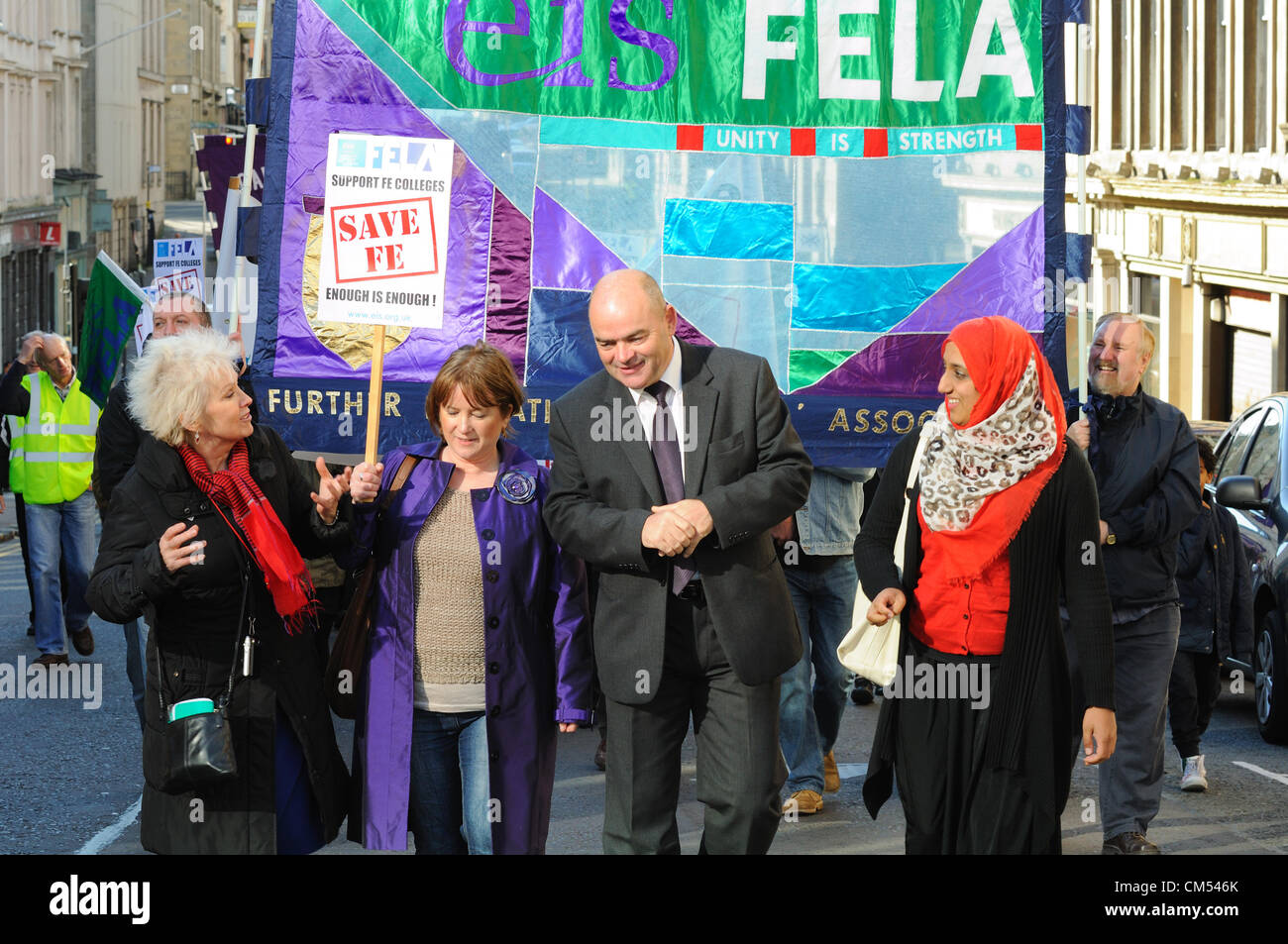 Glasgow, Scotland, UK. Saturday 6th October. EIS teaching members march though Glasgow city centre in protest against proposed cuts to further education colleges. Larry Flanagan, Susan Quinn, Penny Gower in attendance. Stock Photo