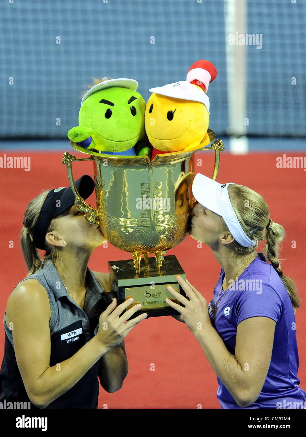 06.10.2012.  Beijing, CHINA; Elena Vesnina and Ekaterina Makarova of Russia defeat Nuria Llagostera Vives of Spain and Sania Mirza of India 2:0 during the Women's doubles final of the China Open at the China National Tennis Center. Stock Photo