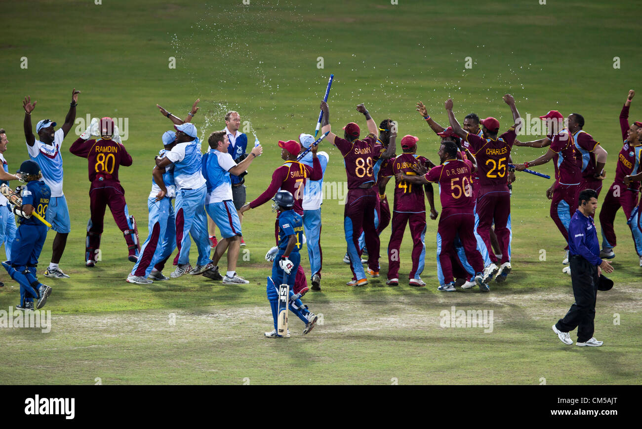 Water bottles suffice before the champagne is opened while the last two Sri Lankan batsmen leave the field Stock Photo