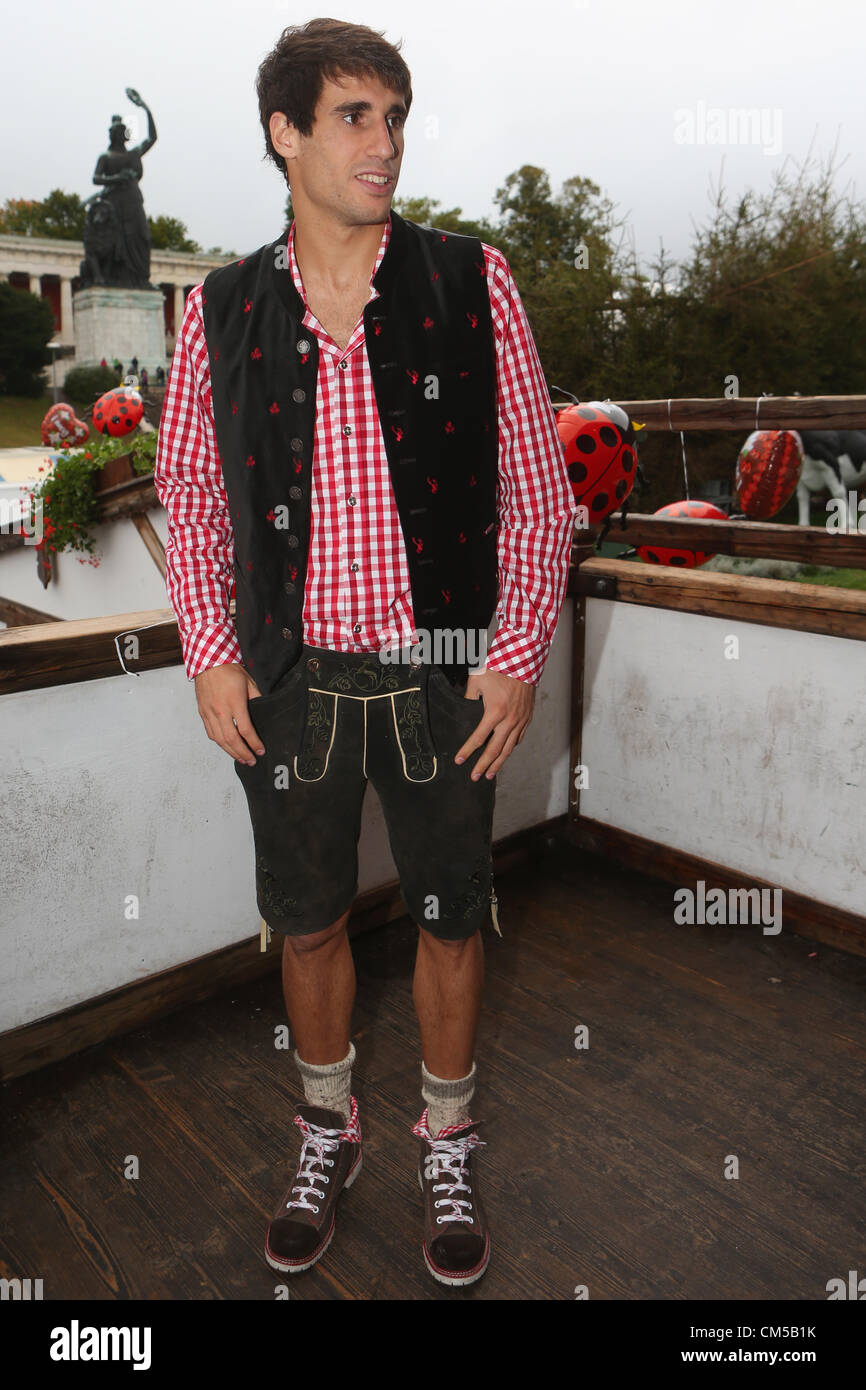 MUNICH, GERMANY - OCTOBER 07:  Javi Martinez of FC Bayern Muenchen arrives at the Oktoberfest beer festival at the Kaefer Wiesnschaenke tent on October 7, 2012 in Munich, Germany. Stock Photo