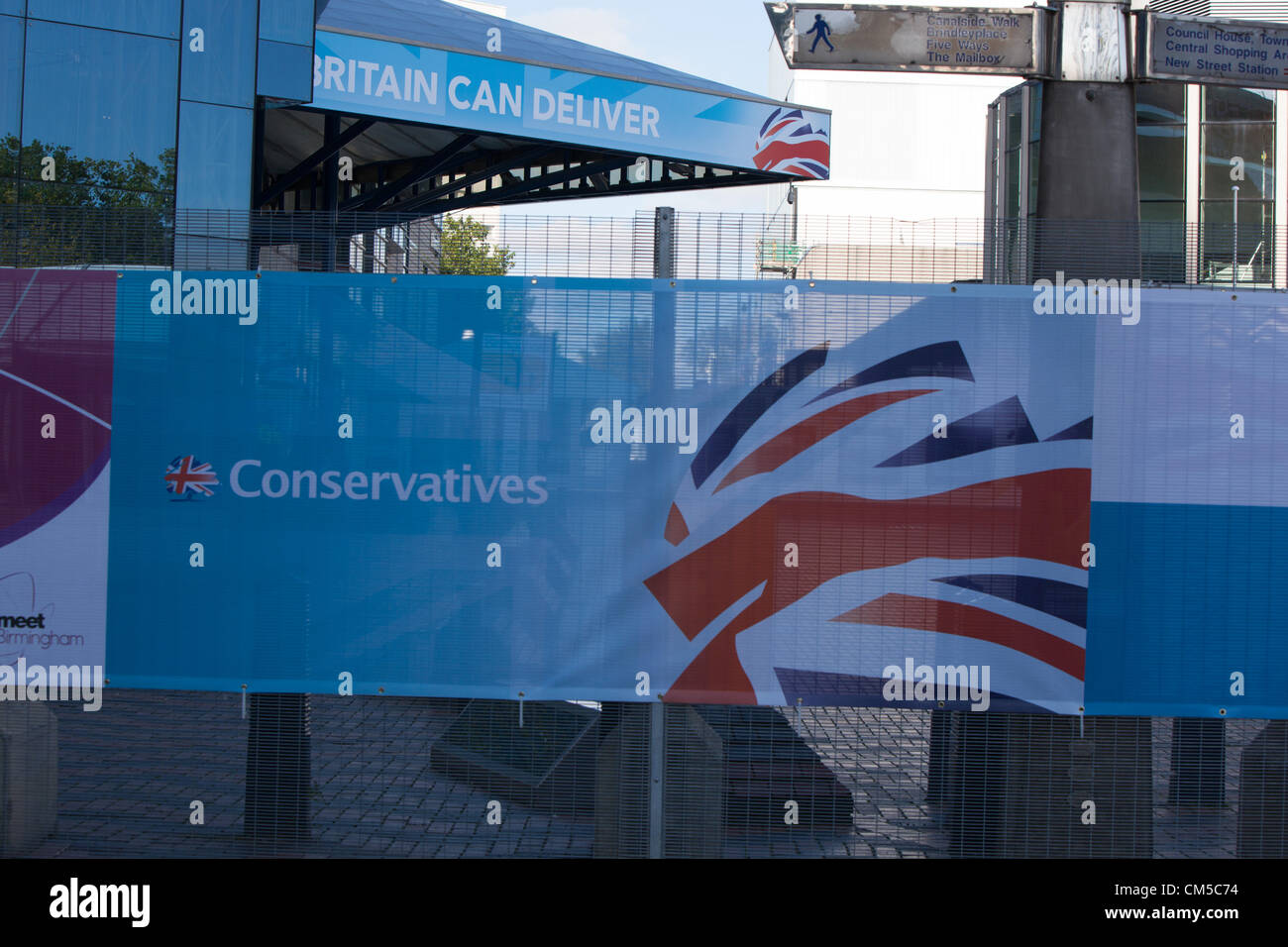 Conservative Party banner fixed to fence near the ICC for their conference. Stock Photo