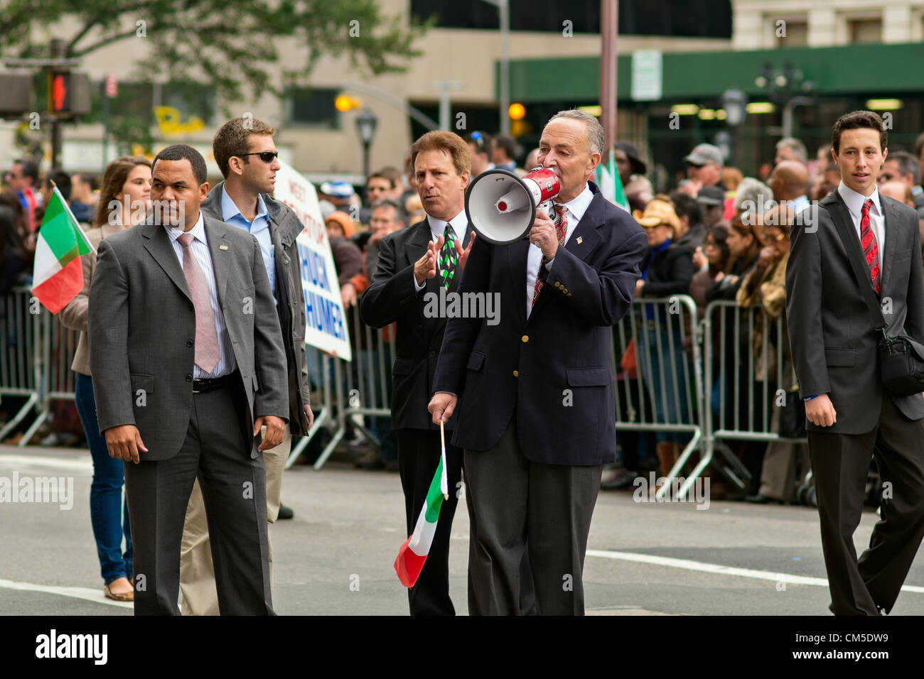 New York, NY, October 8, 2012.  US Senator Charles Schumer (Democrat of New York) alks to the crowd through a bullhorn during New York City's annual Columbus Day parade up 5th Avenue. Stock Photo