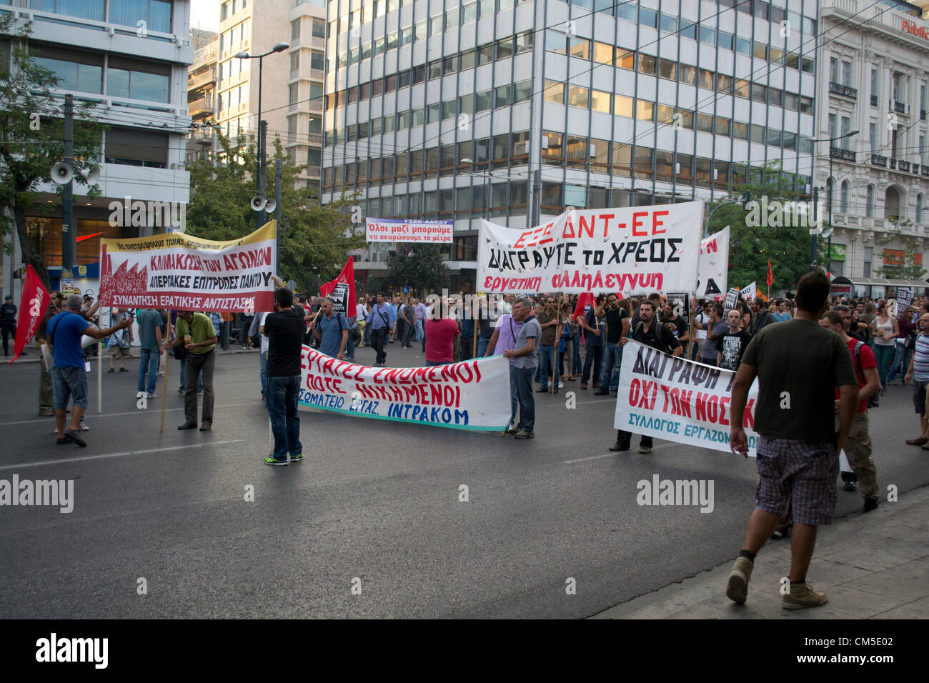 Athens, Greece, 8th October 2012. Public and Private sector unions demonstrate in front of the Greek Parliament. Protesters held banners and shouted slogans against the upcoming privatizations, austerity package and A. Merkel's visit to Greece. Credit:  Nikolas Georgiou / Alamy Live News Stock Photo