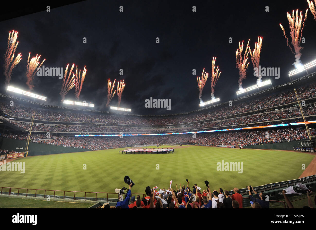 Rangers Ballpark in Arlington, OCTOBER 5, 2012 - MLB : A general view. Fireworks explode during pre game ceremonies before the American League Wild Card Playoff game against the Baltimore Orioles at Rangers Ballpark in Arlington in Arlington, Texas, United States. (Photo by AFLO) Stock Photo