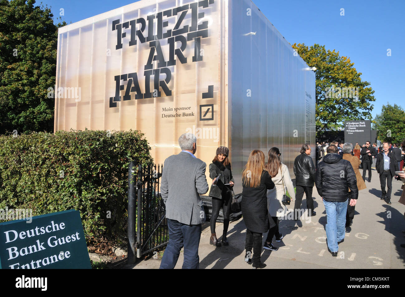 Regents Park, London, UK. 10th October 2012. Visitors arrive at the Frieze Art Fair in Regents Park. The largest contemporary art event in the UK opens to the public. The art fair is sponsored by Deutsche Bank and features work by over a 1,000 living artists. Credit:  Matthew Chattle / Alamy Live News Stock Photo