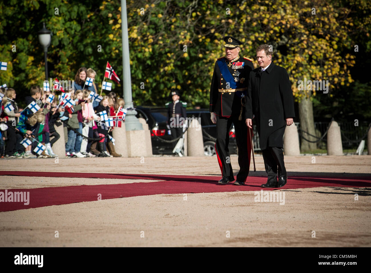 Oslo, Norway. 10/10/2012. The Finnish president Sauli Niinsto and The Norwegian King Harald seen outside the castle in Oslo. Stock Photo
