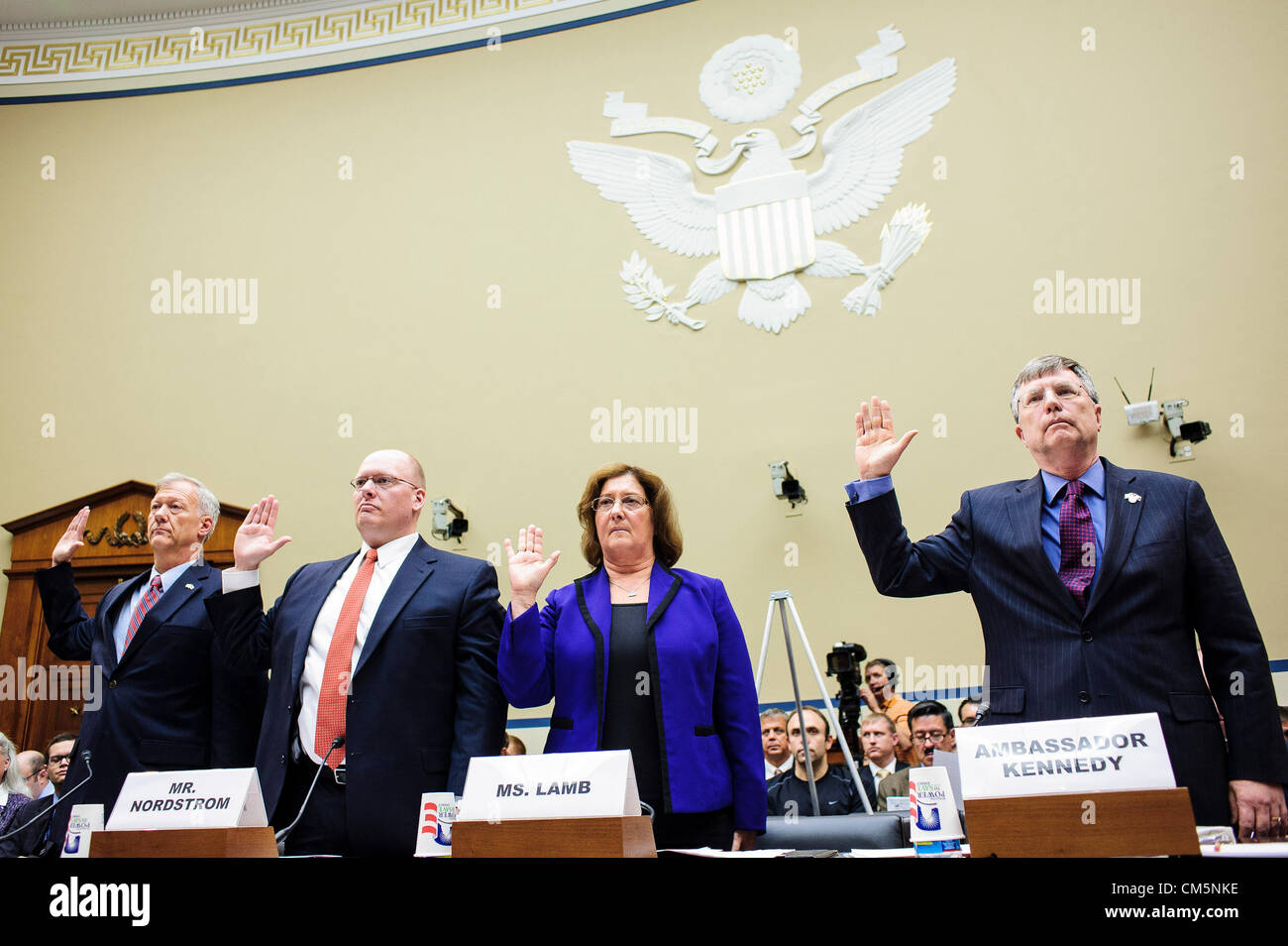 Oct. 10, 2012, Washington DC, U.S. Lt. Col. ANDREW WOOD, Utah National Guard, U.S. Army, ERIC NORDSTROM, regional security officer at the State Department, Deputy Assistant Secretary of State for International Programs CHARLENE LAMB of the Bureau of Diplomatic Security and Undersecretary of State for Management PATRICK KENNEDY are sworn in before the House Oversight and Government Reform Committee during a hearing focusing on the security situation in Benghazi leading up to the Sept 11 attack that resulted in the assassination of U.S. Ambassador to Libya J. Christopher Stevens. Stock Photo