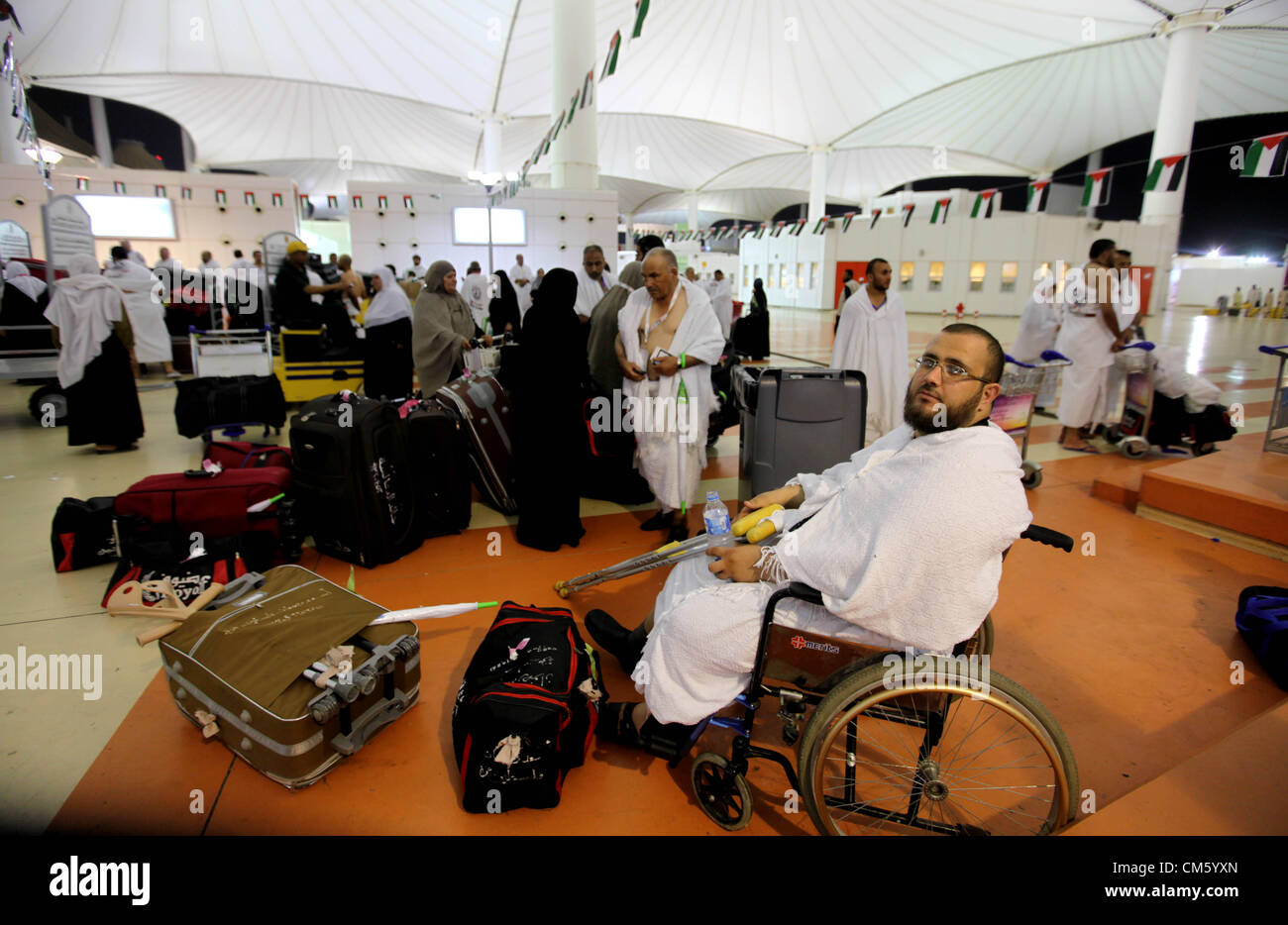 Oct. 11, 2012 - Jeddah, Jeddah, Saudi Arabia - Palestinian Muslim pilgrims arrive at the King Abdulaziz international airport as they prepare to go for their pilgrimage to Mecca, Oct. 12,2012. The event is held in preparation for carrying out the five pillars of Islam in the Holy Land, when they will make their Hajj to Mecca  (Credit Image: © Momen Faiz/APA Images/ZUMAPRESS.com) Stock Photo
