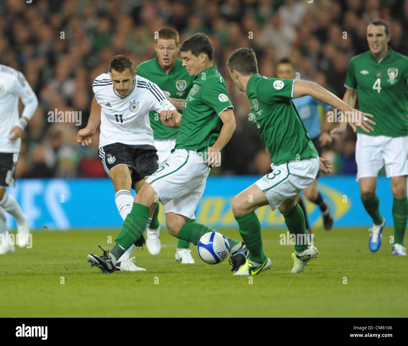12.10.2012 Dublin , Ireland.  Miroslav Klose of Germany with Darren O'Dea and Stephen Ward of Republic of Ireland during the World Cup Group C qualifier  between the Republic of Ireland  and Germany from the Aviva Stadium, Dublin. Stock Photo