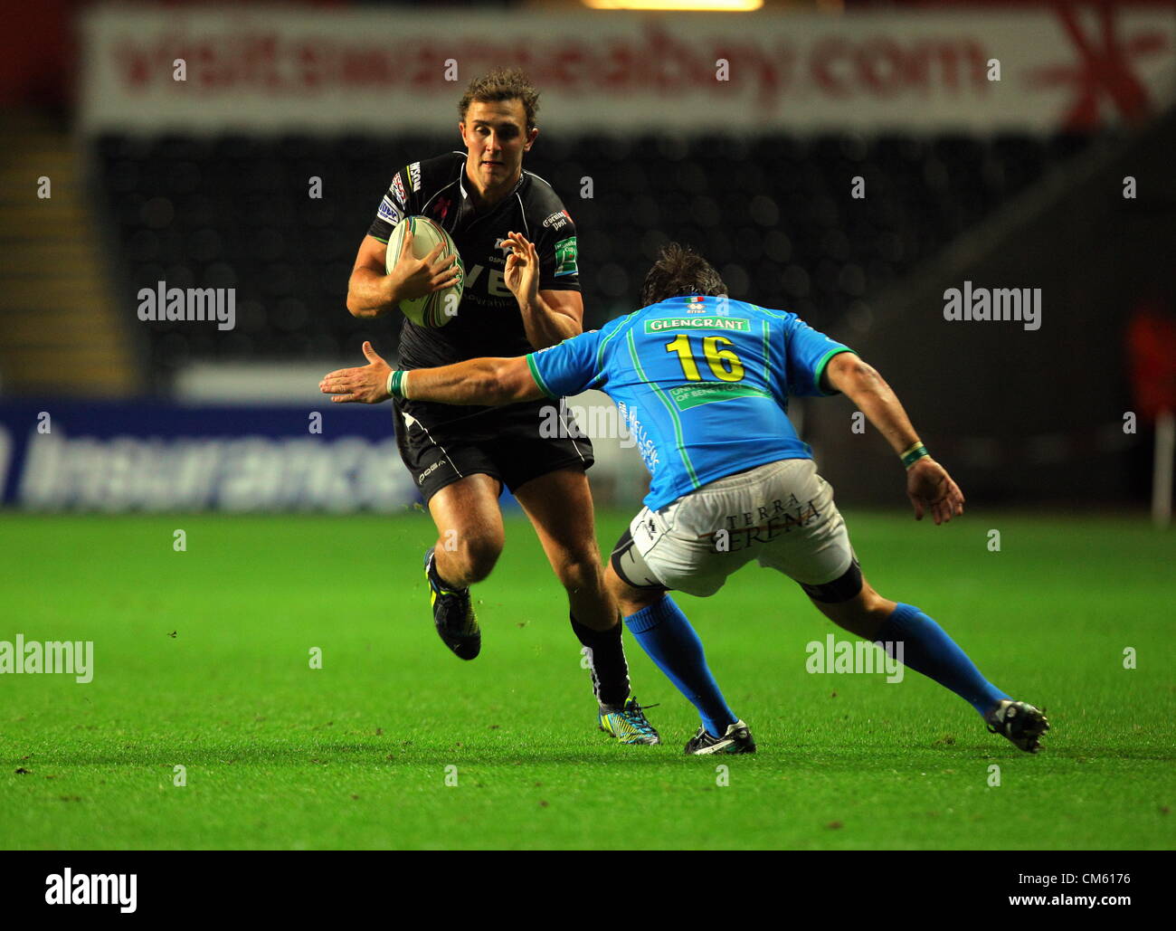 Friday 12 October 2012  Pictured L-R: Ashley Beck of the Ospreys against Enrico Ceccato of Benetton Treviso.   Re: Heineken Cup, Ospreys v Benetton Treviso at the Liberty Stadium, SWansea, south Wales. Stock Photo