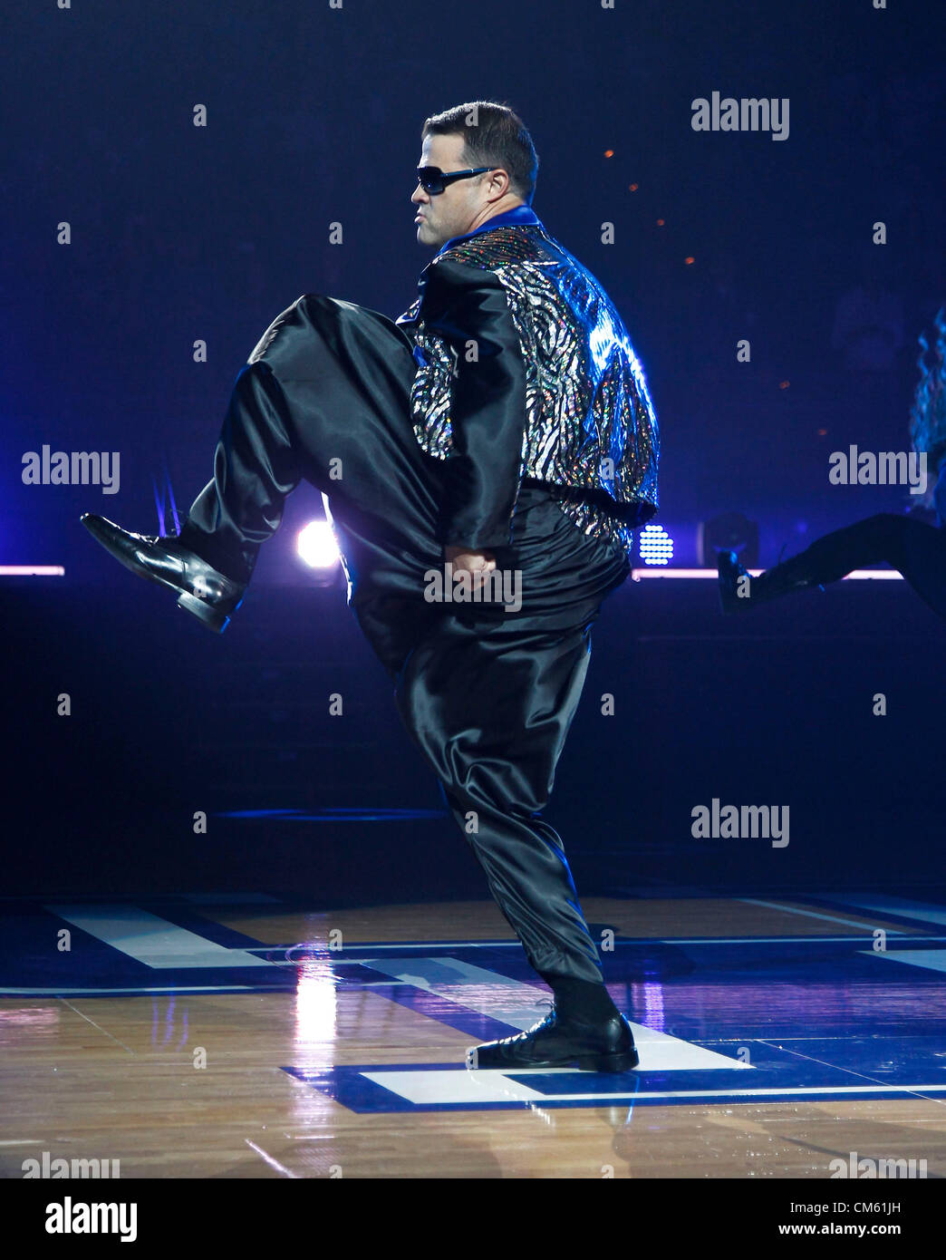 Oct. 12, 2012 - Lexington, Ky, USA - UK womens coach Matthew Mitchell dancing as . Hammer, during Big Blue Madness on Friday October 12, 2012 in Lexington, Ky. Photo by Mark Oct. 12, 2012 - Lexington, Ky, USA - UK womens coach Matthew Mitchell dancing as . Hammer, during Big Blue Madness on Friday October 12, 2012 in Lexington, Ky. Photo by Mark