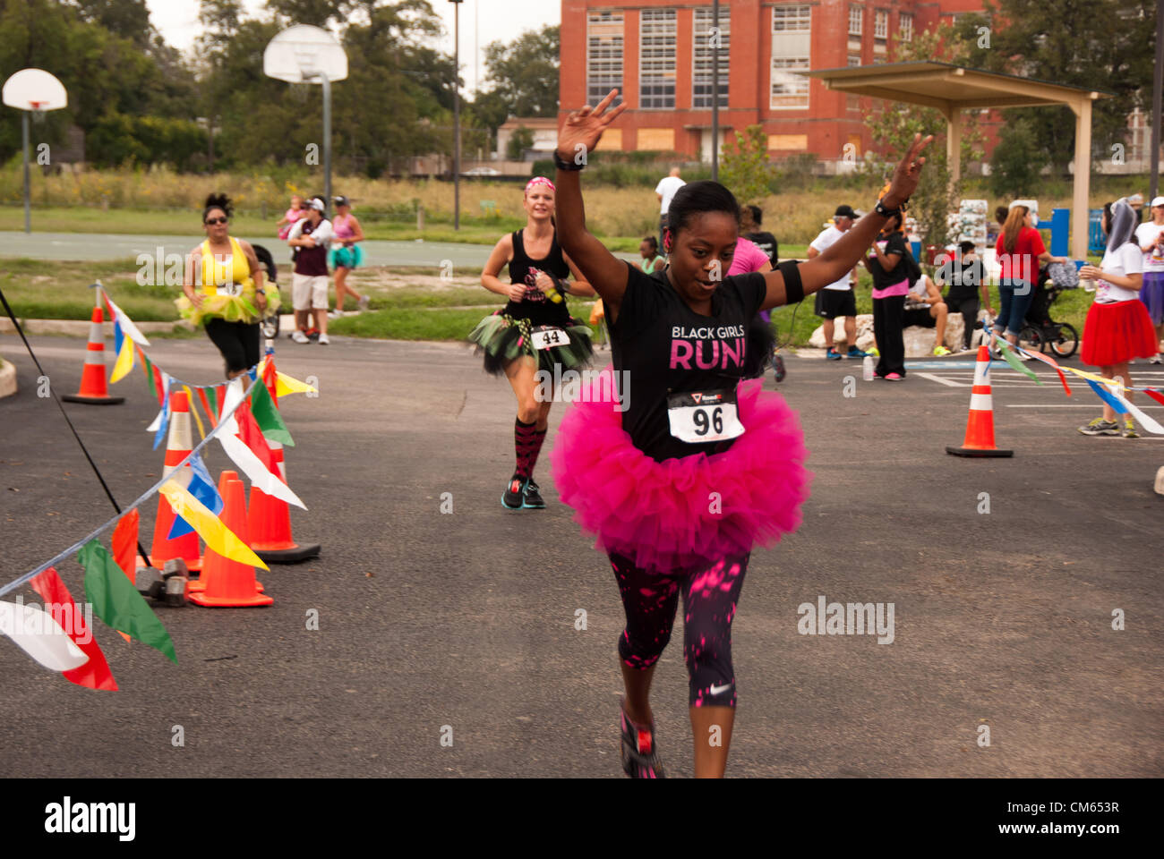 13 October 2012 San Antonio, Texas, USA - 240 Runners participated in the inaugural Tutus & Brews 5k/10k run to raise money for the Cystic Fibrosis Foundation. Runners were encouraged to wear a tutu during the run, and beer was made available to runners after the event. Stock Photo