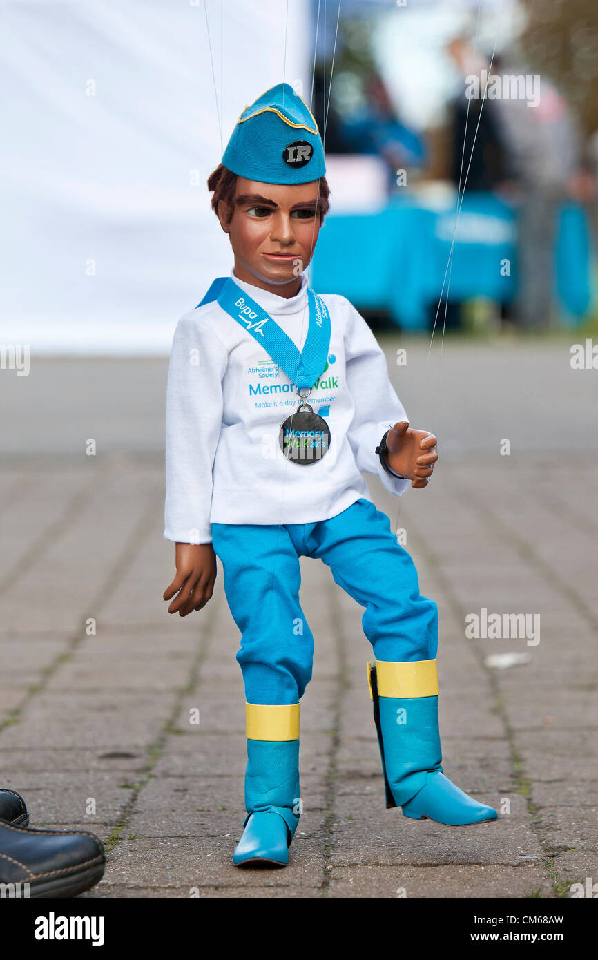 Thunderbirds character Virgil Tracy joined the Alzheimers Society final Memory Walk of the year at Eton Dorny Lake in Windsor.     Jamie Anderson, son of Thunderbirds creator Gerry Anderson, was taking part in the sponsored walk on Saturday in support of his father who revealed in the summer he was suffering from Alzheimer's disease.    The Virgil puppet and members of Fanderson, the official appreciation society of Gerry's work, joined other 'Memory Walkers' in support of the charity, walking 16km around the Olympic Rowing Centre. Stock Photo