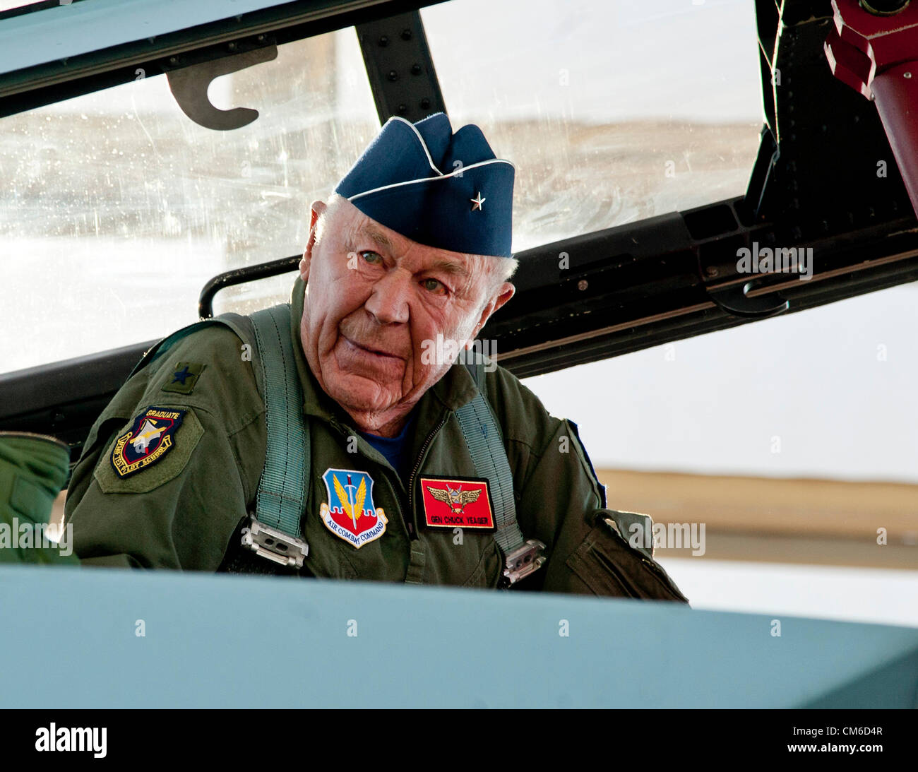 Retired United States Air Force Brig. Gen. Chuck Yeager, 89, in the cockpit on an F-15D Eagle fighter aircraft to celebrate the 65th anniversary of becoming the first person to break the sound barrier October 14, 2012, at Nellis Air Force Base, Nevada. In 1947 Yeager broke the sound barrier in a Bell XS-1 rocket research plane named Glamorous Glennis. Stock Photo