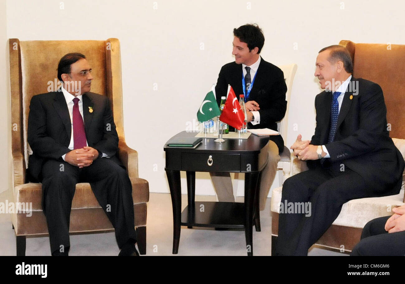 Pakistan President, Asif Ali Zardari exchanges views with Turkish Prime Minister, Recep Tayyip Erdogan during meeting on the sidelines of Twelfth  ECO Summit in Baku on Tuesday, October 16, 2012. Stock Photo