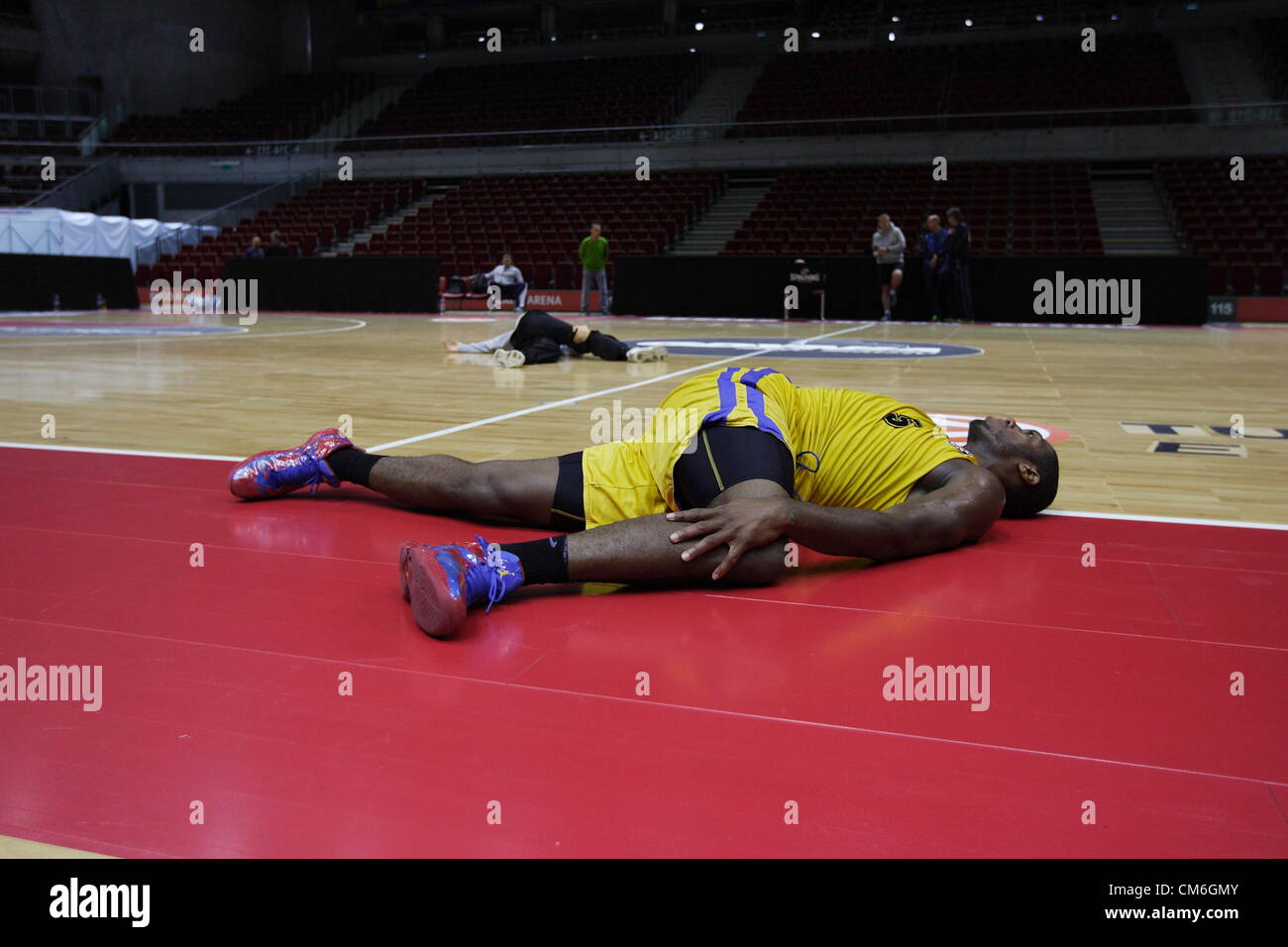 Gdansk, Poland 16th, October 2012. Asseco Prokom Gdynia training before the basketball Turkish Airlines Euroleague game with ACB - Unicaja Malaga. Defender Frank Robinson  during the stretching. Stock Photo