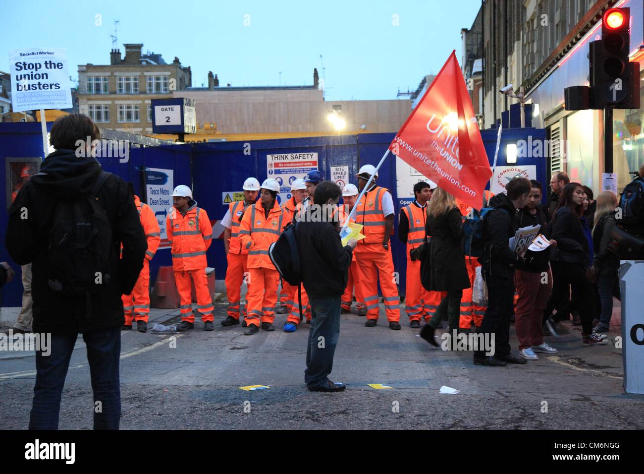 London, UK. 17th October 2012  A group of protestors blocked off a junction on Oxford Street, close to a Cross Rail work site. They were protesting against what they say are union victimization and blacklisting for the workers. Stock Photo