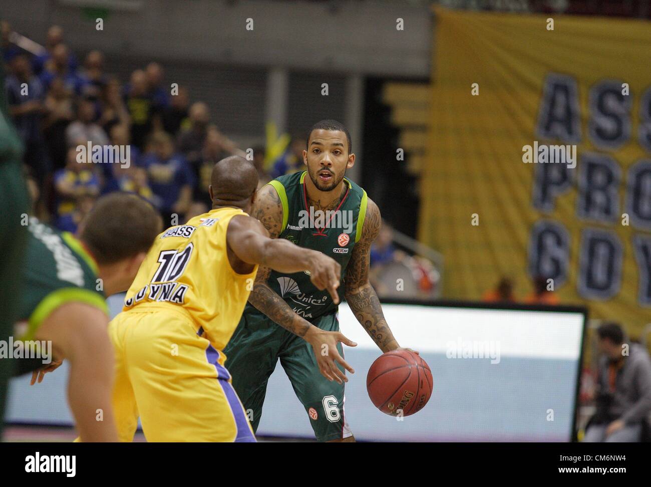 Gdansk, Poland, 17th October 2012 Basketball: Turkish Airlines Euroleague group B. Marcus Williams (6) in action against Jerel Blassinagem (10) during Asseco Prokom Gdynia v Unicaja Malaga game at ERGO Arena sports hall in Gdansk Stock Photo