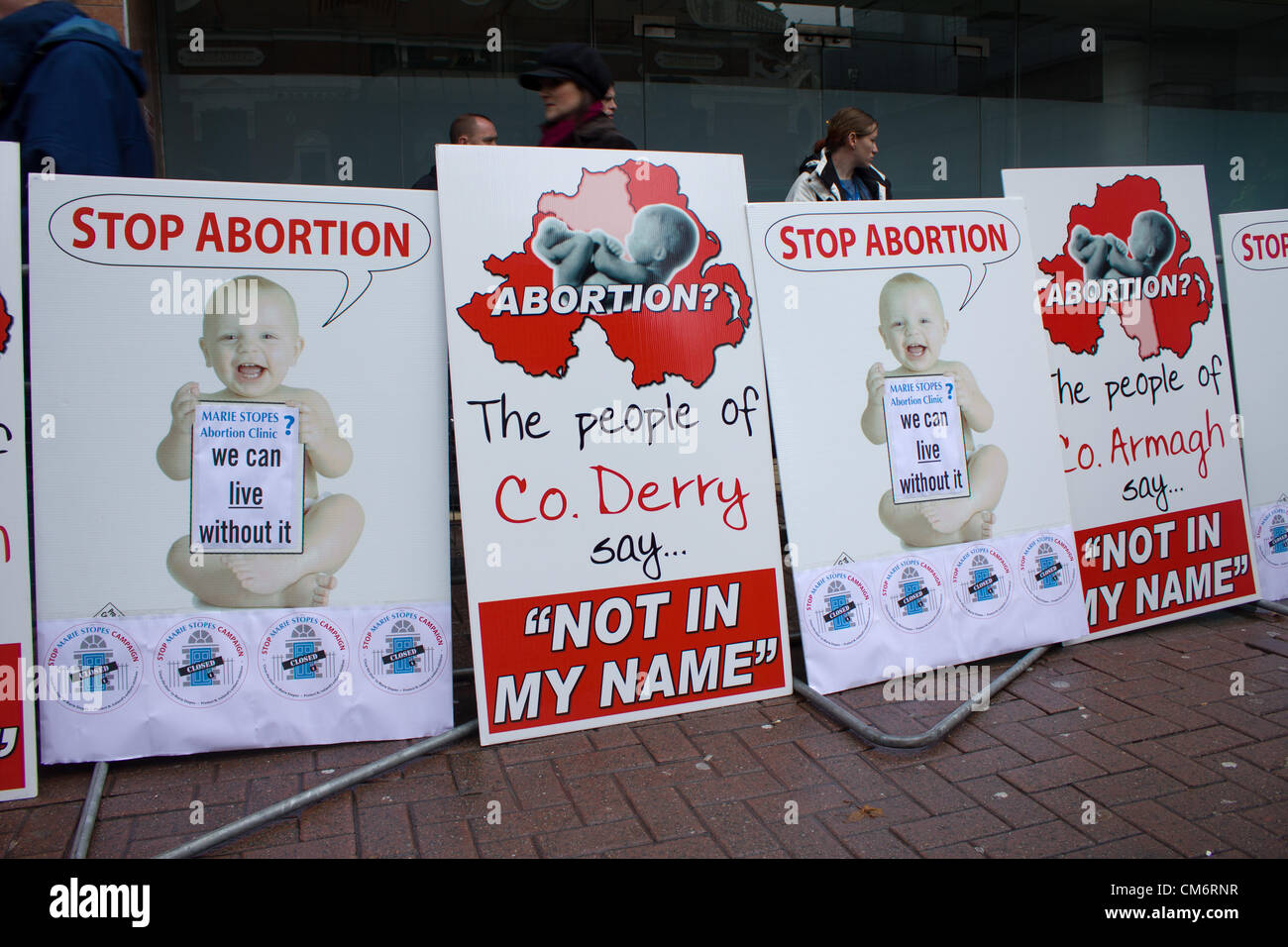 Belfast, UK. 18th October, 2012. Anti-abortion signs on show at the new Marie Stopes clinic in Belfast, the first private clinic in Northern ireland to offer abortions. The clinic, which opened today, offers abortions under the law in Northern Ireland. Stock Photo