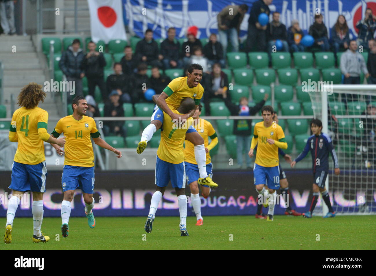 Paulinho (BRA), OCTOBER 16, 2012 - Football /Soccer : Paulinho (top) of Brazil celebrates with his teammates Ramires #7 after scoring the opening goal during the international friendly match between Japan 0-4 Brazil at Municipal Stadium in Wroclaw, Poland. (Photo by Jinten Sawada/AFLO) Stock Photo