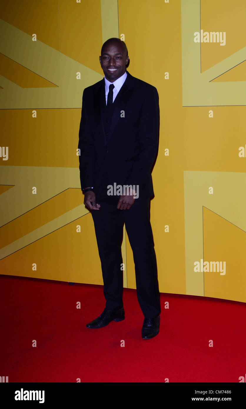 London, UK. October 19th 2012: Marlon Devonish poses for photos at the 'UK Athletics Dinner' held at the Royal courts of Justice, London, UK. Credit:  Duncan Penfold / Alamy Live News Stock Photo