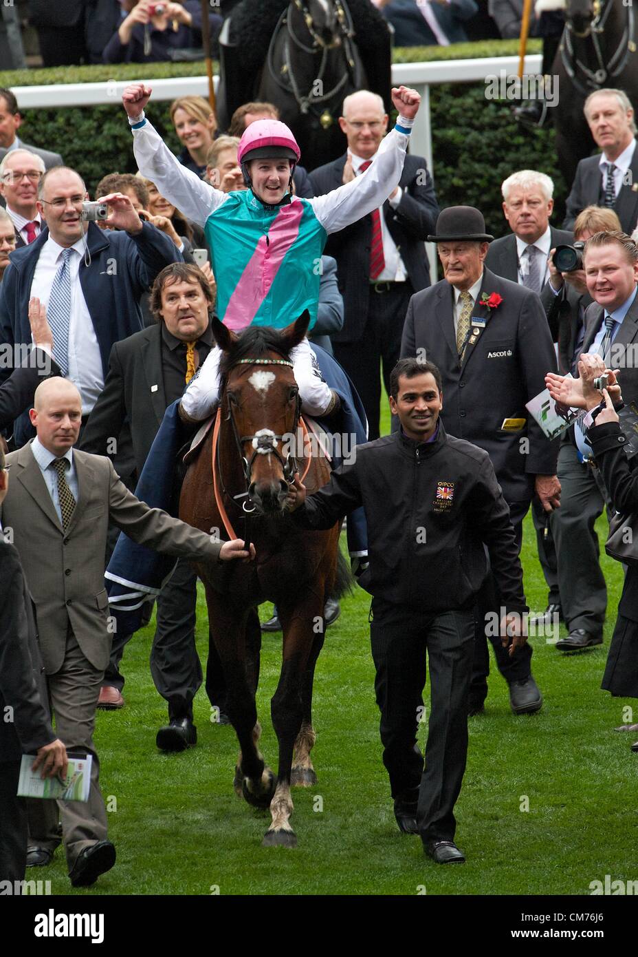 Ascot, UK. 20th October 2012. Jockey Tom Queally returns to the winners enclosure on board Frankel after winning the Qipco Champion Stake Credit:  Paul McCabe / Alamy Live News Stock Photo