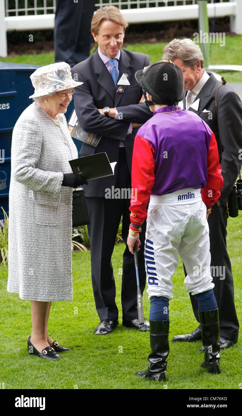 Ascot, UK. 20th October 2012. Queen Elizabeth II in the parade ring at Ascot, with jockey Ryan Moore, prior to the Qipco Queen Eliabeth II Stake Credit:  Paul McCabe / Alamy Live News Stock Photo
