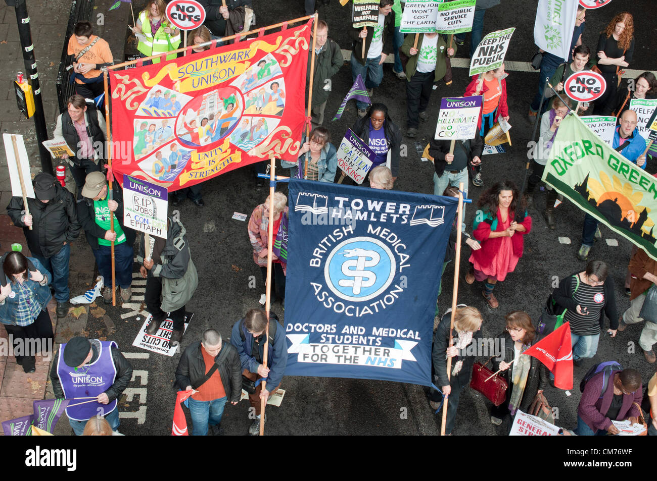 20/10/2012, London UK. Union banners fly as the TUC stage a mass protest against the UK government's austerity cuts. A march through central London culminated in a rally in Hyde Park. Stock Photo