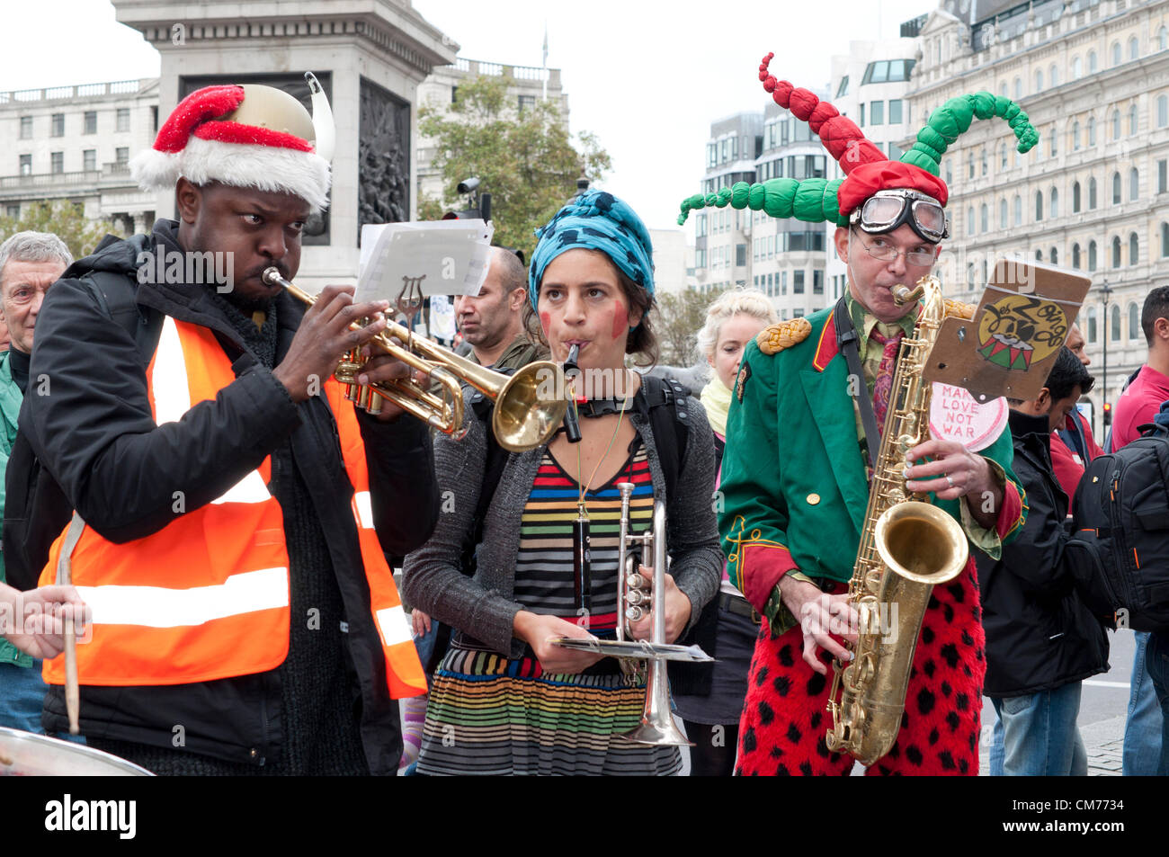 20/10/2012, London UK. Costumed musicians perform in Trafalgar Square as unions stage a mass protest against the UK government's austerity cuts. A march through central London culminated in a rally in Hyde Park Stock Photo
