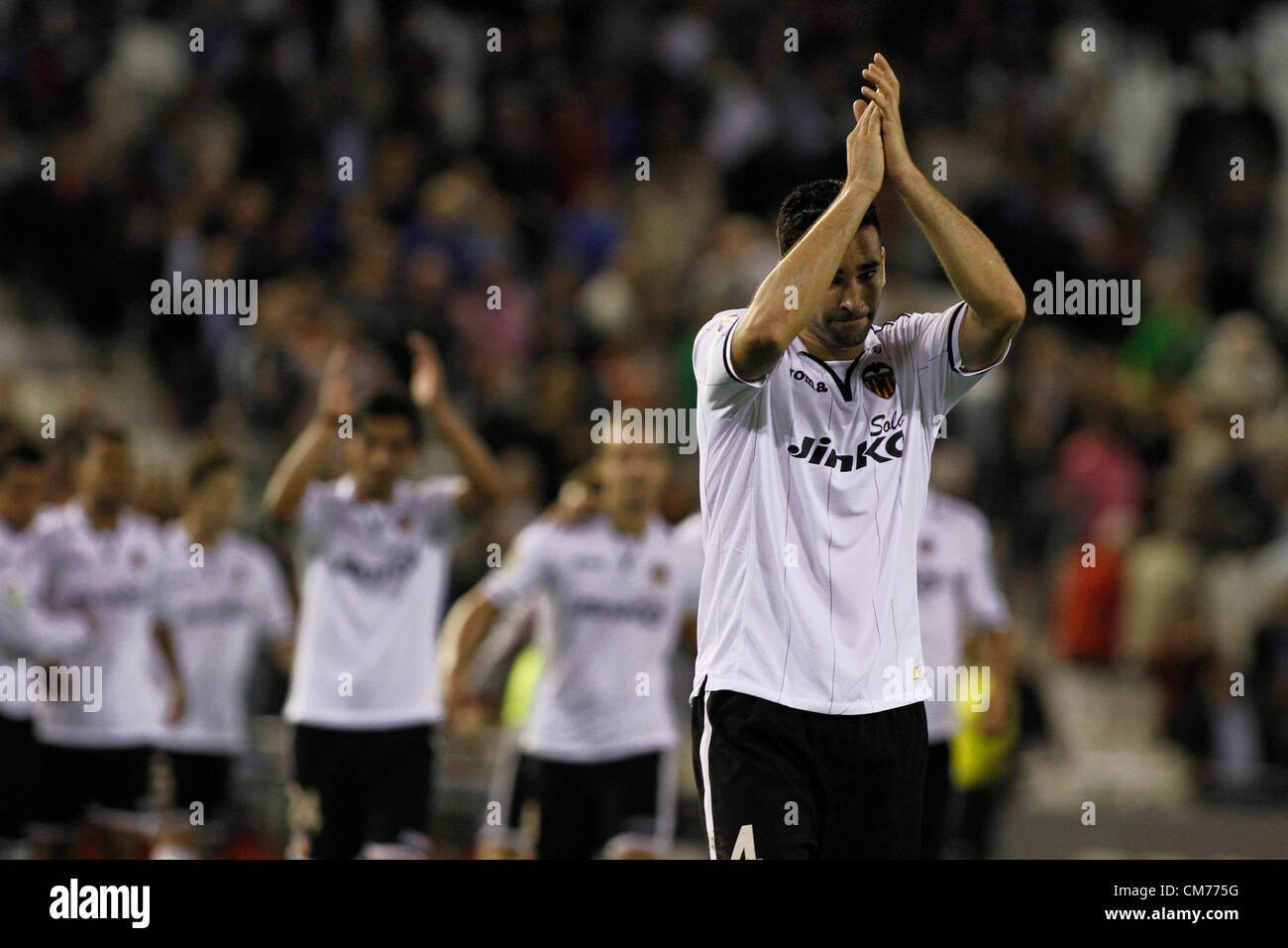 La Liga Spain - Matchday 9 - Valencia CF vs. Ath. Bilbao - Adil Rami claps to celebrate victory with the attendants Stock Photo