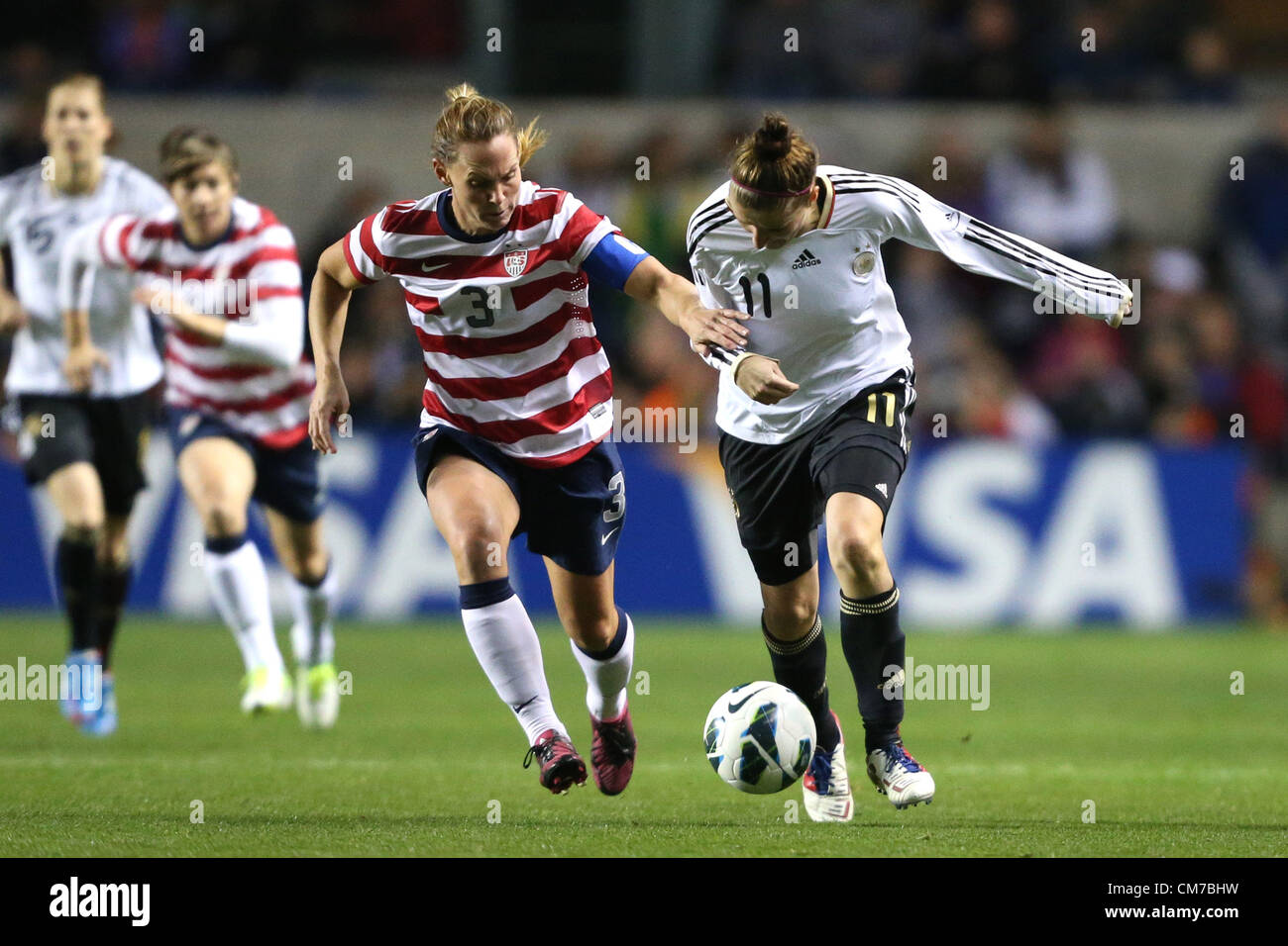 20.10.2012. Chicago, USA.  Anja Mittag (GER) (11) and Christie Rampone (USA) (3). The United States Women's National Team played the Germany Women's National Team at Toyota Park in Bridgeview, Illinois in a women's international friendly soccer match. The game ended in a 1-1 tie. Stock Photo