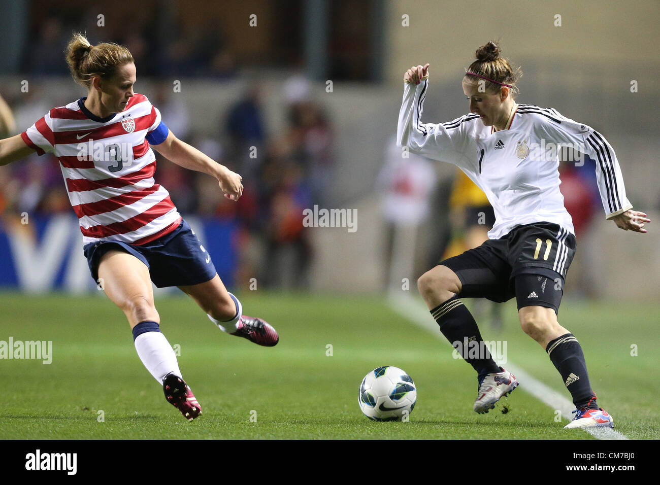 20.10.2012. Chicago, USA.  Anja Mittag (GER) (11) and Christie Rampone (USA) (3). The United States Women's National Team played the Germany Women's National Team at Toyota Park in Bridgeview, Illinois in a women's international friendly soccer match. The game ended in a 1-1 tie. Stock Photo