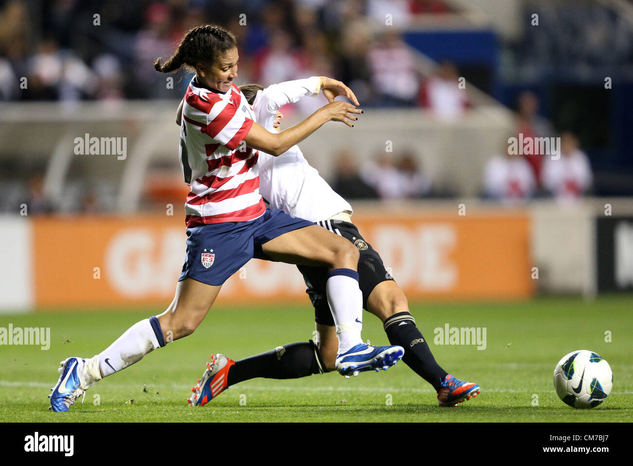 20.10.2012. Chicago, USA.  Shannon Boxx (USA) (left) and Dzsenifer Marozsan (GER) (behind). The United States Women's National Team played the Germany Women's National Team at Toyota Park in Bridgeview, Illinois in a women's international friendly soccer match. The game ended in a 1-1 tie. Stock Photo