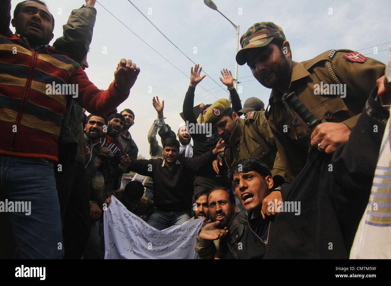 Oct. 23, 2012 - Srinagar, Kashmir - Indian police detain class four employees of the Health Department during a protest. The protesters alleged that their pay has been with withheld for unknown reasons. (Credit Image: © Altaf Zargar/ZUMAPRESS.com) Stock Photo