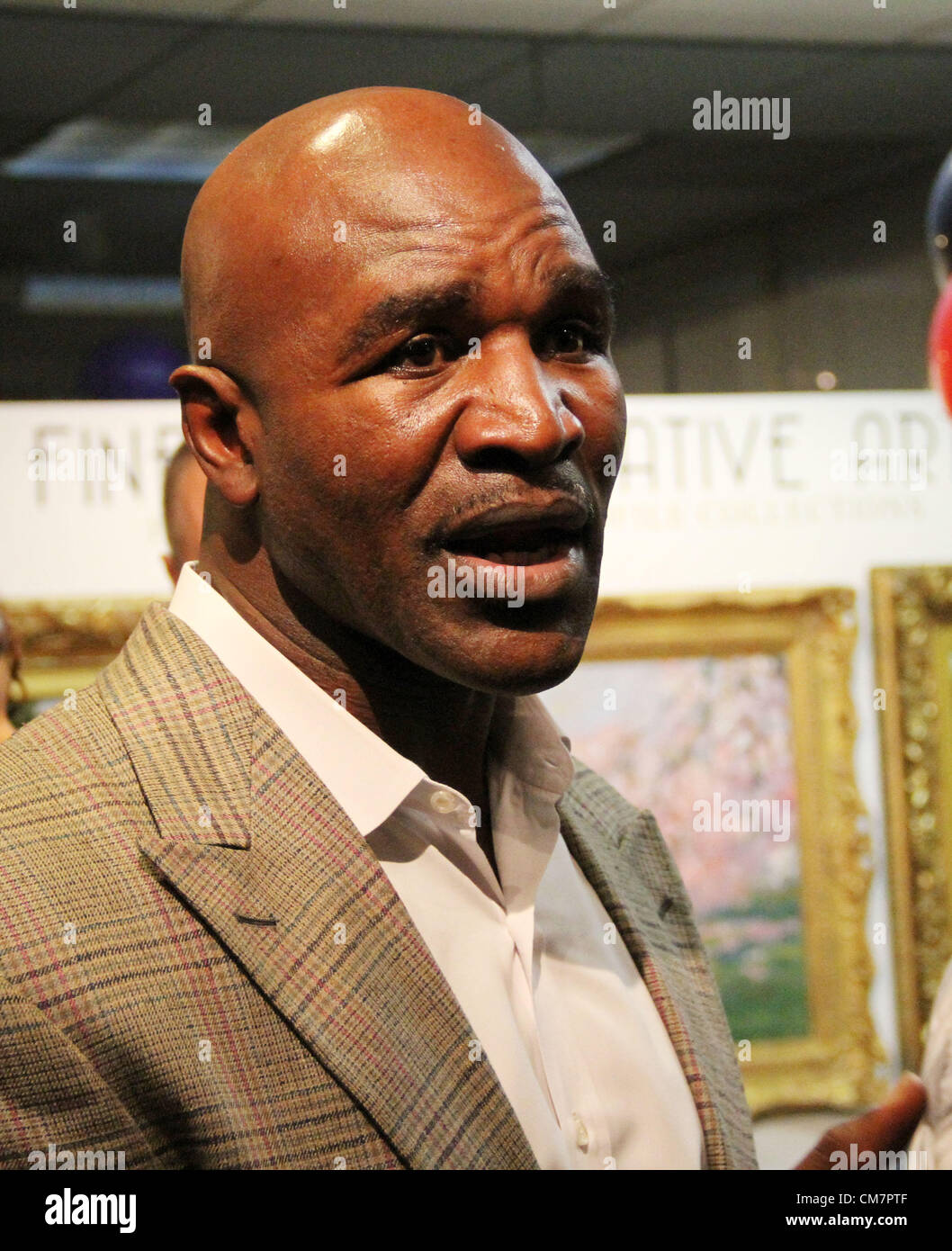 Oct. 19, 2012 - Los Angeles, California, USA - Five time World Heavy Weight Champion Evander  ''The Real   Deal'' Holyfield during his 50th.  birthday celebration and   auction of his memorabilia at  Julien s Auctions in Beverly   Hills, CA. on Friday October  19, 2012. (Credit Image: © Burt Harris/Prensa Internacional/ZUMAPRESS.com) Stock Photo