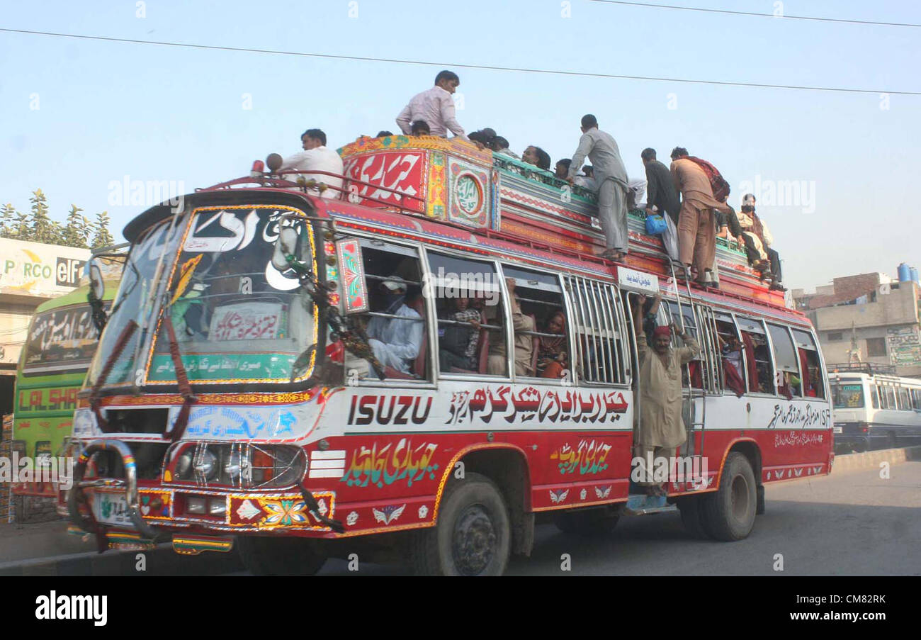 People to board on passenger bus as they are going to their native ...