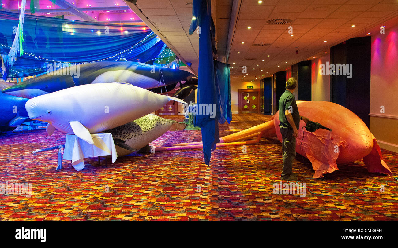 A giant squid is inflated whilst the gentle sound of bubbles and whale