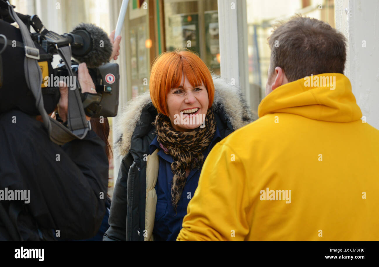TOWN leaders have urged the Liskeard community to come together as it prepares to welcome retail guru Mary Portas back for the Big Clean Up this weekend. Hundreds gather to help with the Big Clean in Fore Street Liskeard. Saturday 27 10 2012 Picture By Sean Hernon. Stock Photo
