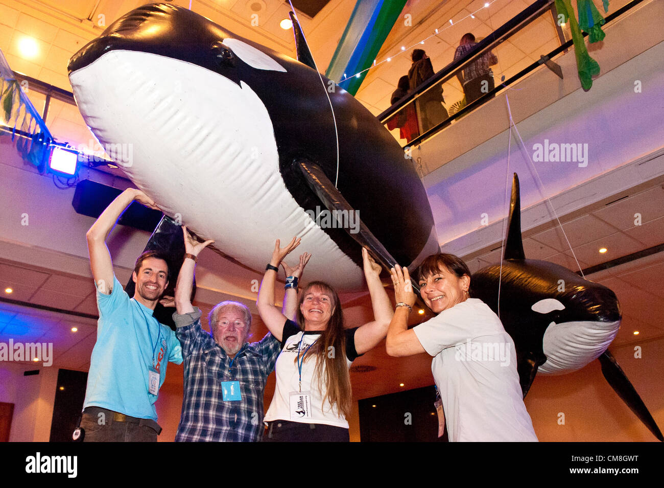 Brighton, UK. 28th October, 2012. Supporting Marine Conservation and giving  a hand with the Orcas co-founder of WhaleFest Dylan Walker with Whale Rescue.Org co founder Jo Halliday,Dr Ingid Visser of Orca Research Trust and Bill Oddie during Whalefest at the Hilton Metropole, Brighton 28th October 2012 photo©Julia Claxton Stock Photo