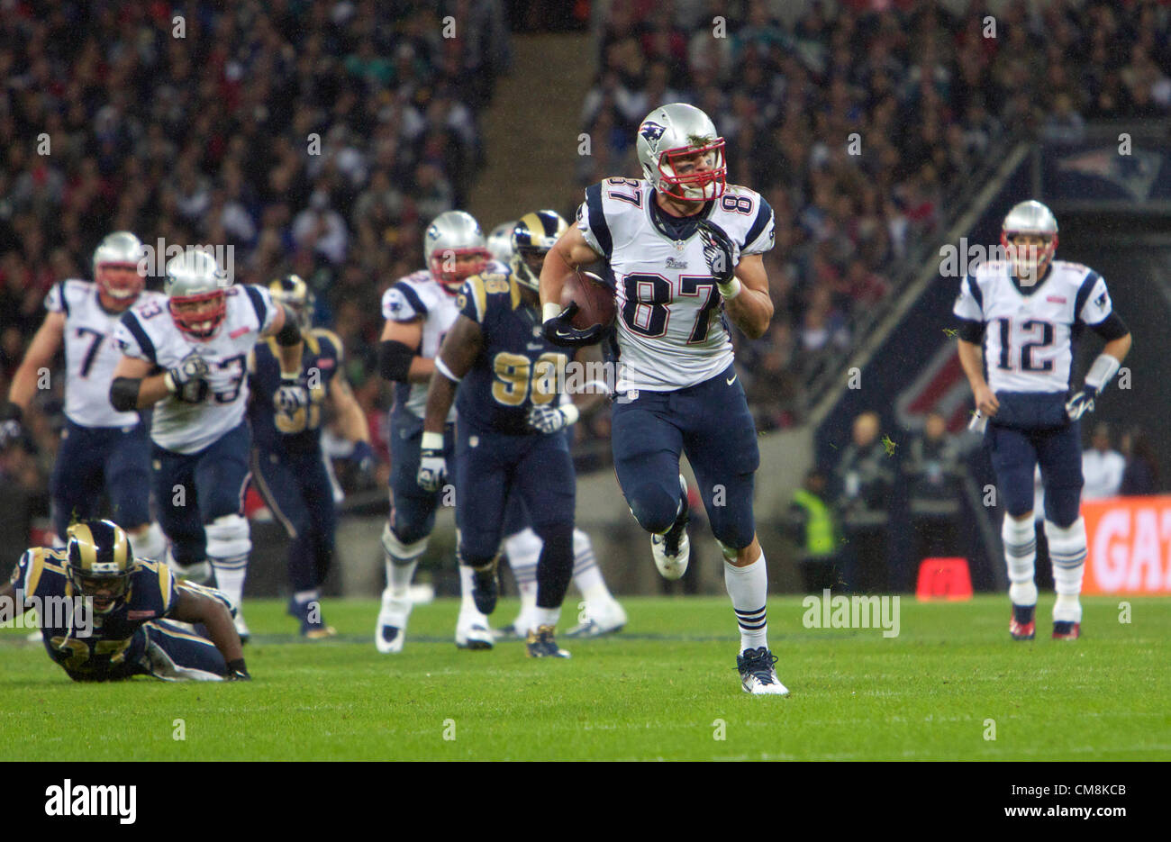 28.10.2012 London, England. NE Patriots WR Wes Welker is tackled by The  Rams Defence during the NFL International Series 2012 game between The Bill  Belichick and Tom Brady led New England Patriots