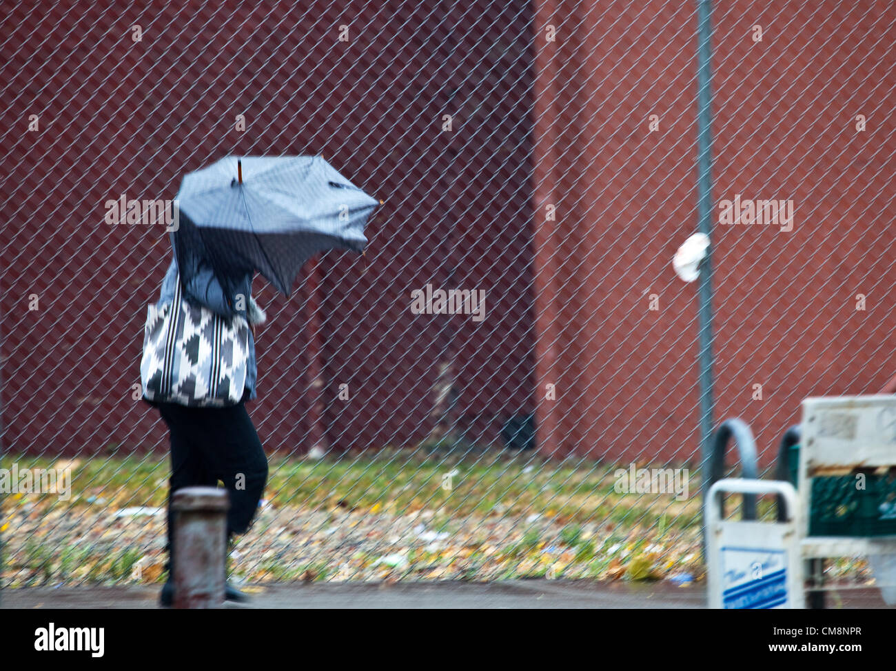 Struggling with wind hi-res stock photography and images - Alamy